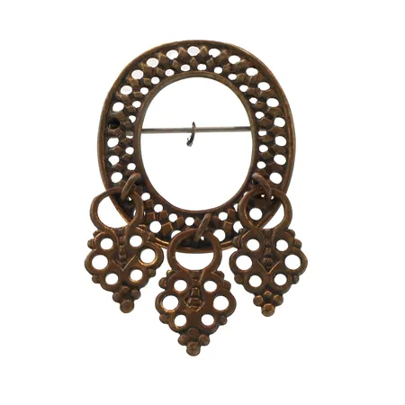 Rintakoru Kalevala Koru, Lapin solki, korkeus 54mm, pronssia