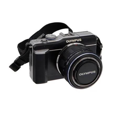 Digikamera Olympus E-PL1, objektiivi Olympus M. Zuiko Digital 14-42mm 1:3.5-5.6, laukku ja laturi