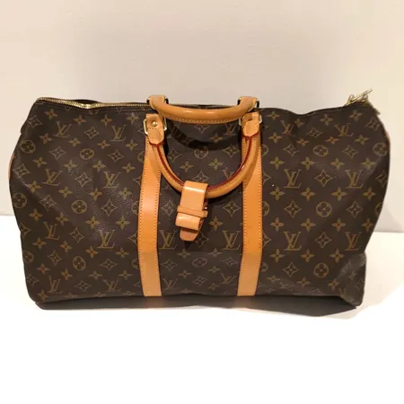 Laukku Louis Vuitton, Keepall 50, M41414 , Made in France, käytöstä aiheutunutta kulumaa, DU1142, mitat 50x23x30cm, kuvausta muutettu 20.2.2026 klo 10.28 Paino: 0 g