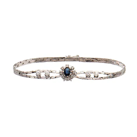 Timanttirannekoru kivellä 4xn.0.09ct ja 8xn.0.01ct, pituus 185mm, 585br valkokulta, Paino: 8,4 g