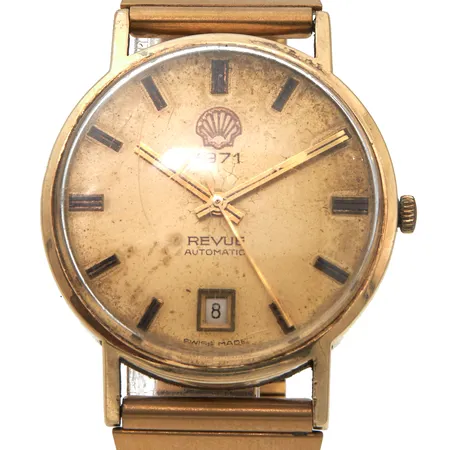 Kultarannekello Revue, Shell, Automatic, swiss made, rungon Ø34mm, 585br, S:N 15641A, käytön jälkiä, ranneke ei alkuperäinen, teräsrannekkeen pituus muutettavissa, Paino: 59,7 g
