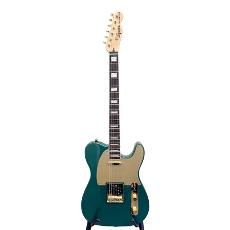 Sähkökitara Squier Telecaster 40th Anniversary Gold Edition, ISSL21004101, Made in Indonesia, ostokuitti F-musiikki 2022, Fenderin kitaranauha ja kova kantolaukku.  Ei lähetetä