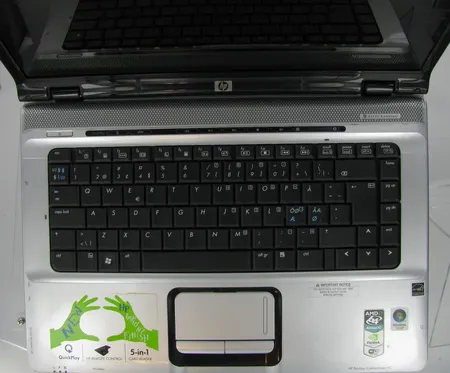 Kannettava tietokone HP Pavilion dv6000 ja virtajohto