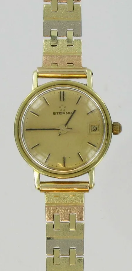 Naisten kultarannekello Eterna quartz, kaiverrettu, 3-väri kultarannekkeella, 585br, paino 23,5g Vikt: 23,5 g