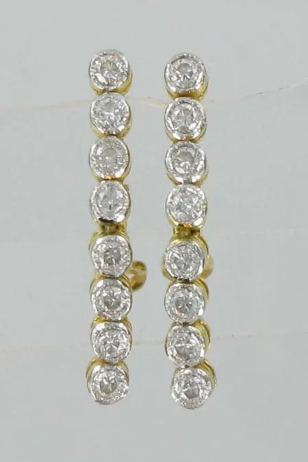 Timanttikorvakorut, 16xn.0,03ct, 750, paino 2,9g Vikt: 2,9 g