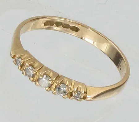 Timanttisormus 1xn.0.04ct 2xn.0.02ct 2 xn.0.005ct, kaivertamaton, koko 17, 585, paino 1,6g Vikt: 1,6 g