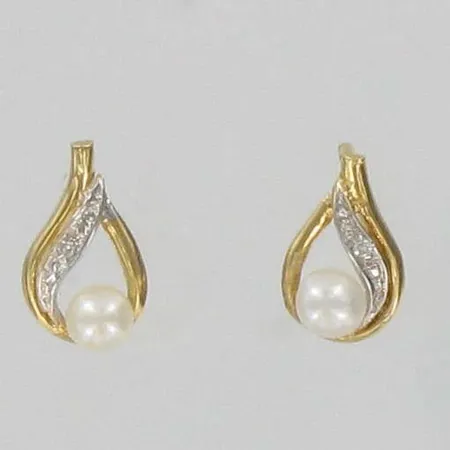Helmikorvakorut timanteilla 2xn.0.005ct, 750br, paino 0,7g Vikt: 0,7 g