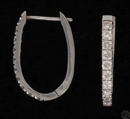 Timanttikorvakorut valkokulta 20xn.0.05ct, korkeus 23mm, 585, paino 5,0g Vikt: 5   g