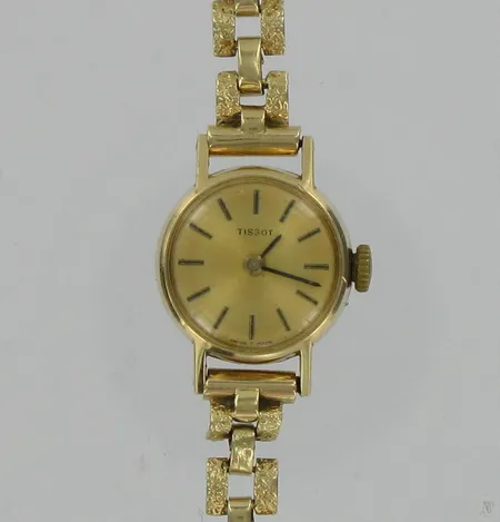 Naisten kultarannekello Tissot, viallinen, 585br, paino 14,9g Vikt: 14,9 g