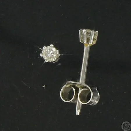 Timanttikorvakorut valkokulta 2xn0.05ct, 585, paino 0,6g, toinen lukko puuttuu Vikt: 0,6 g