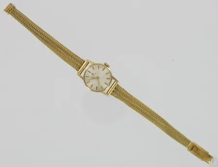 Naisten kultarannekello Omega, kaiverrettu, 585br, paino 19,5g Vikt: 19,5 g