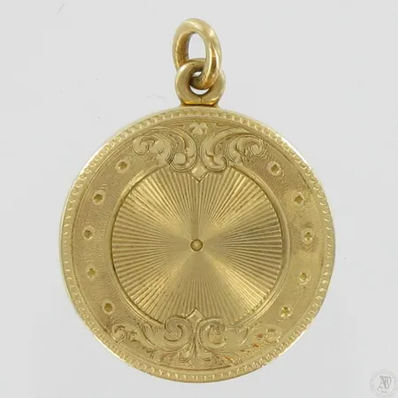 Medaljonki, kaiverrettu, 585, paino 6,8g Vikt: 6,8 g