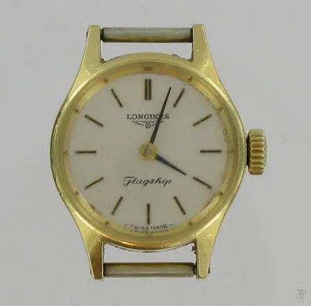 Naisten kultarannekello Longines Flagship, quartz, kaiverrettu, ilman ranneketta, lasissa pieniä naarmuja, 585br, paino 10,6g Vikt: 10,6 g