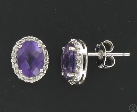 Kivikorvakorut timanteilla 40xn.0.005ct, korkeus 10mm, 585br, paino 2,3g Vikt: 2,3 g