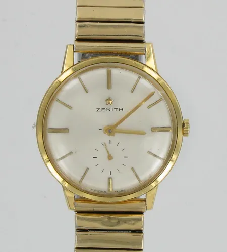 Kultarannekello Zenith, manuaalivetoinen, 18 kivinen caliber 2531, Ø 34mm, kaiverrettu, ranneke metallia ja viallinen, 750br, paino 43,5g Vikt: 43,5 g