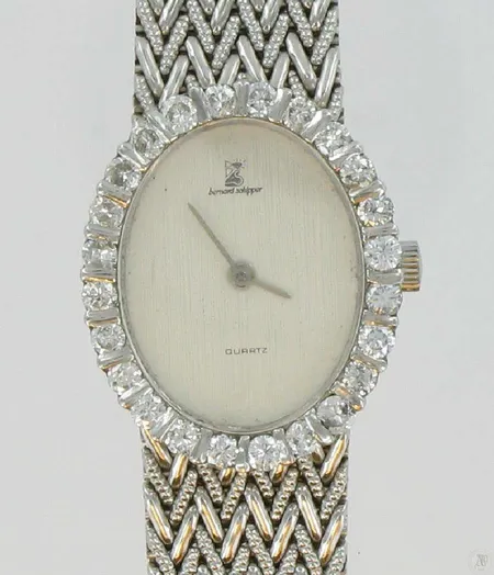Naisten kultarannekello Bernard Schipper kultarannekkeella ja timanteilla 24xn.0.06-0.07ct, quartz, pituus 17,0cm, laatu- ja arvoselvitys, 585vkbr, paino 49,5g Vikt: 49,5 g