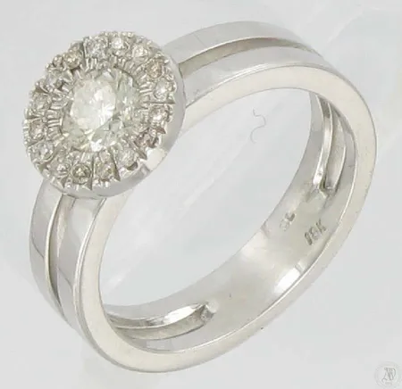 Timanttisormus 1xn.0.45ct 16xn.0.01ct, kaivertamaton, koko 17¼, 750vk, paino  6,7g Vikt: 6,7 g