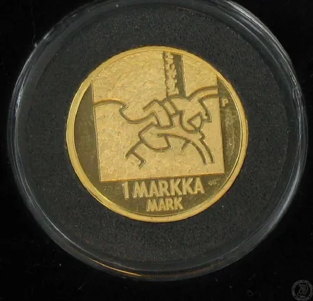 Kultaraha 1 mk v.2001 viimeinen markka laatikossa, kolikon kotelo on avattu
