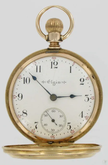 Kultataskukello elgin  Father time 21kiv. koneiston nro.9557008 rungon nro.321385, 585 paino 111,8g