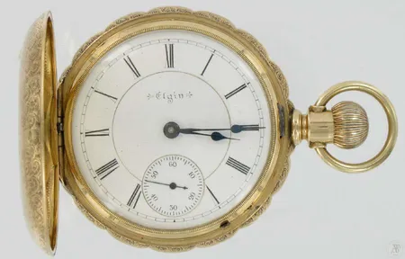 Kultataskukello Elgin 17kiv kaiverrettu, koneiston nro.6727316, rungon nro.38438, 585 paino 128,6g