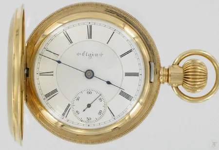 Kultataskukello Elgin 17 kiv. 585br paino 155,3g koneiston no.9087872, rungon no.6133178