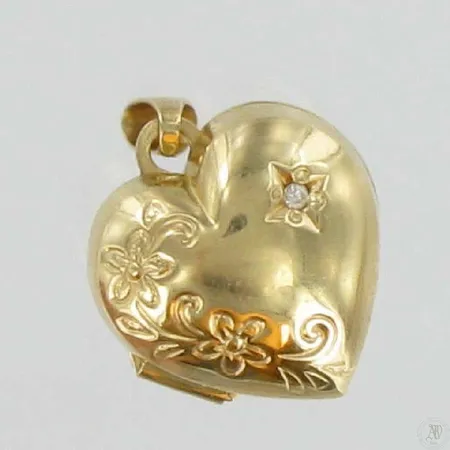  Sydän medaljonki timantilla 1xn.0,005ct, 585, paino 1,4g Vikt: 1,4 g