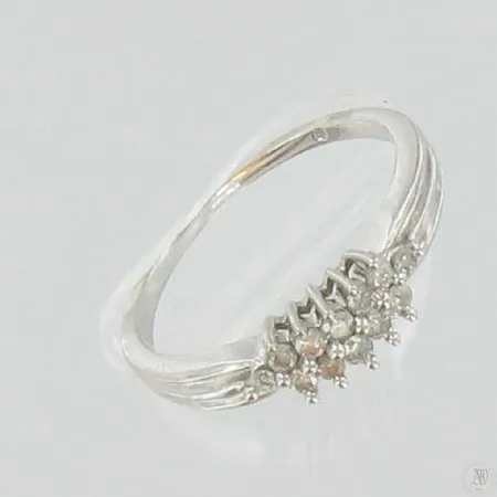 Timanttisormus 12xn.0,02ct, kaivertamaton, koko 17½, 585vk, paino 2,5g Vikt: 2,5 g