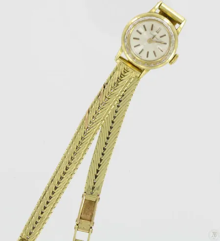 Naisten kultarannekello kultarannekkeella Longines, mekaaninen, kaiverrus, 585br, paino 26,4g Vikt: 26,4 g