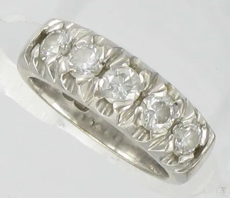 Timanttisormus 5xn.0.20ct, kaivertamaton, koko 16¼, 750vk, paino 8,8g Vikt: 8,8 g