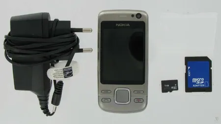 Matkapuhelin Nokia 6600i, muistikortti 1gb ja laturi laatikossa
