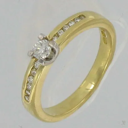 Timanttisormus 1xn.0,14ct 12xn.0,01ct, kaivertamaton, koko 17¼, 750, paino 4,5g Vikt: 4,5 g