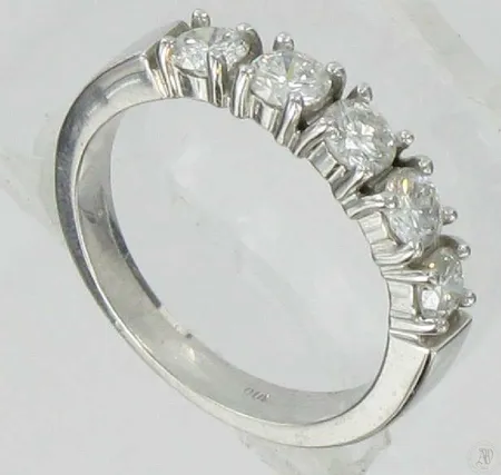 Timanttisormus 5xn.0.20ct, kaivertamaton, koko 17, 585vk, paino 3,8g Vikt: 3,8 g