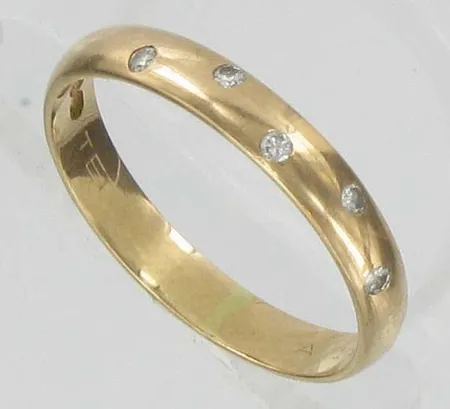 Timanttisormus 5xn.0,01ct kaiverrettu koko 18, 585 paino 2,1g Vikt: 2,1 g