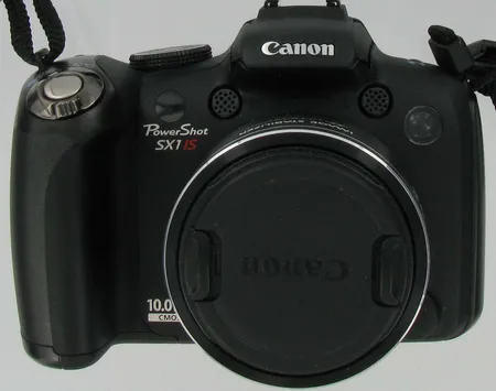 Digikamera Canon Povershot Sx1 is, kaukosäädin ja levyke, 1gb muistikortti