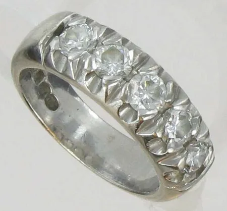 Timanttisormus 5xn.0.20ct, kaivertamaton, koko 16, 750vk, paino 8,7g Vikt: 8,7 g